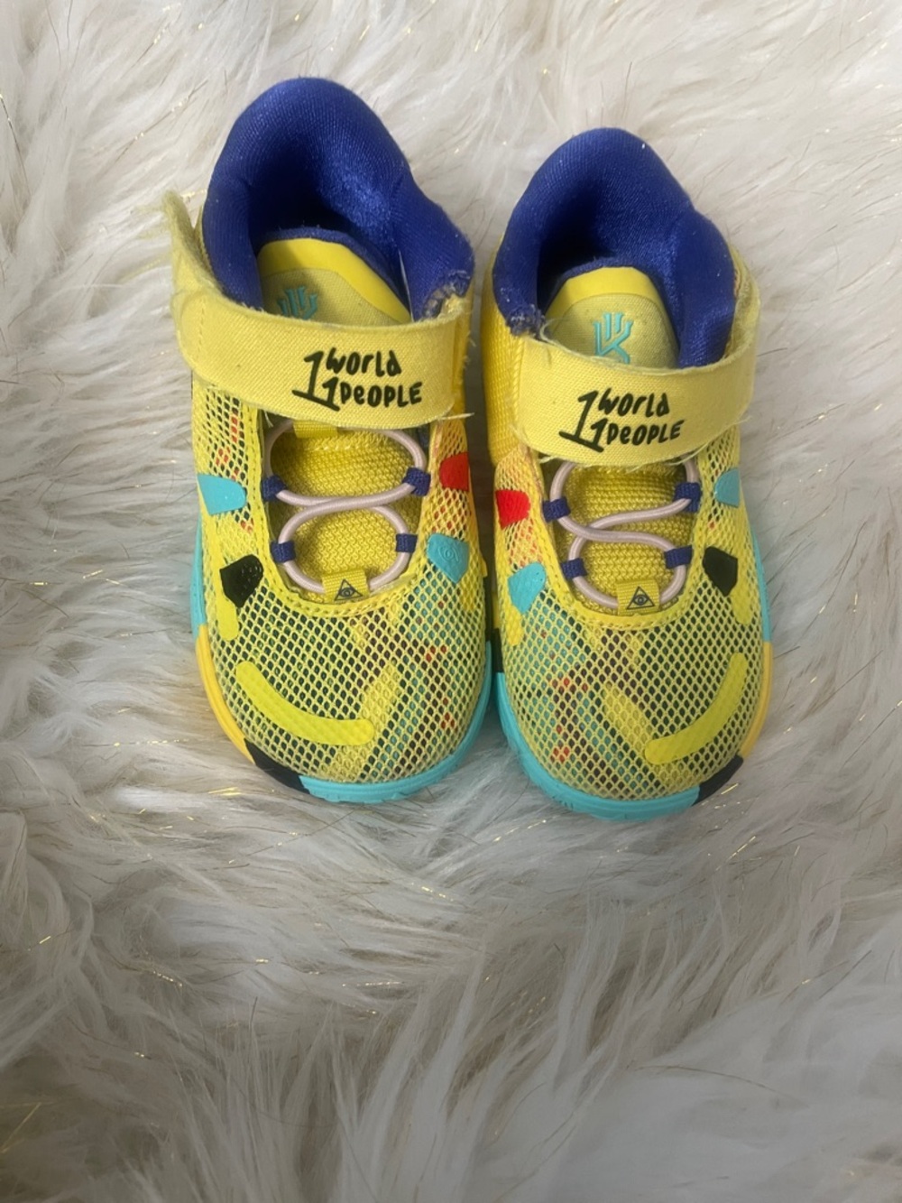 Bright Yellow Kids' Mesh Nike Sneakers with Blue Accents